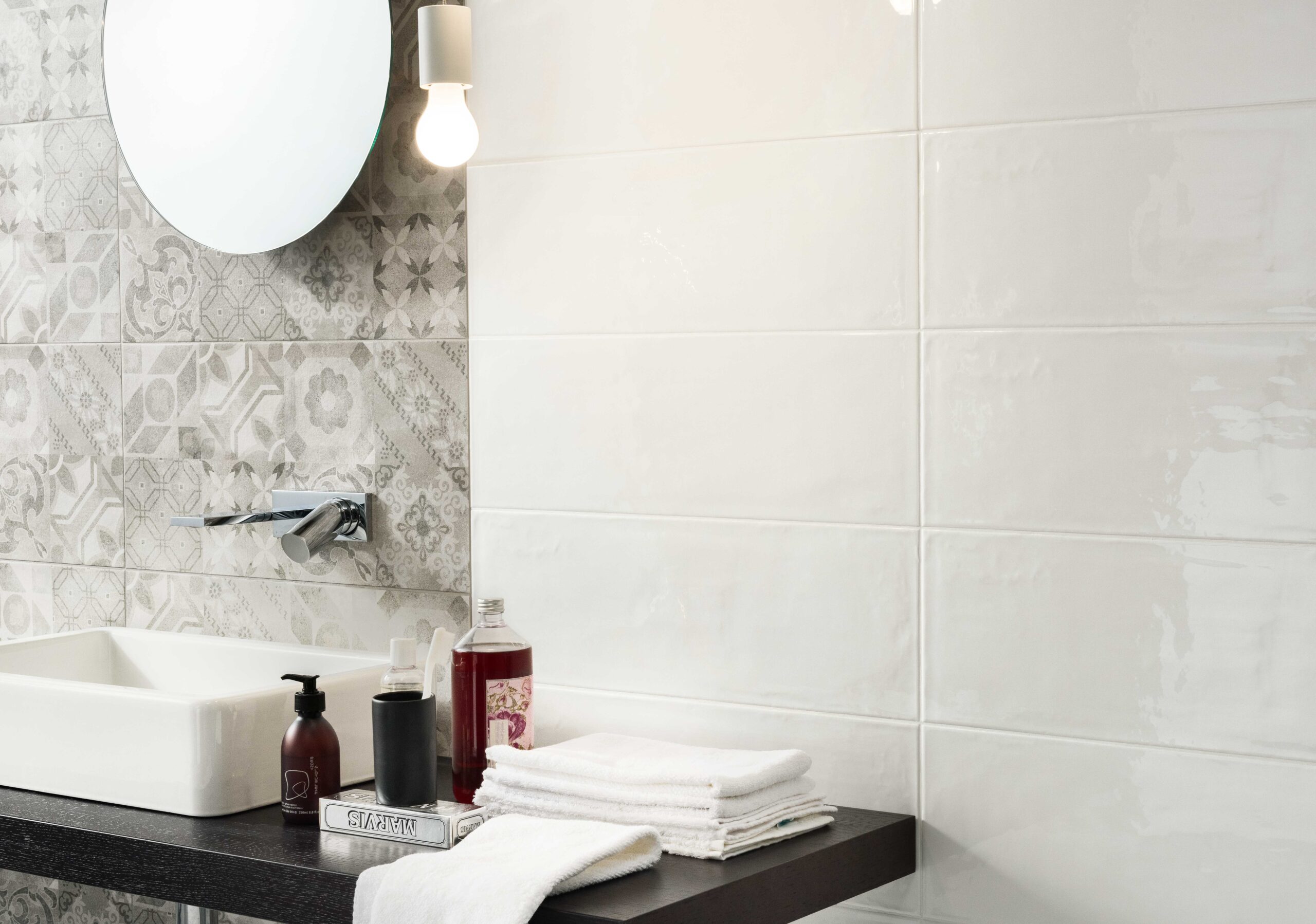 white and silver wall tile in bathroom