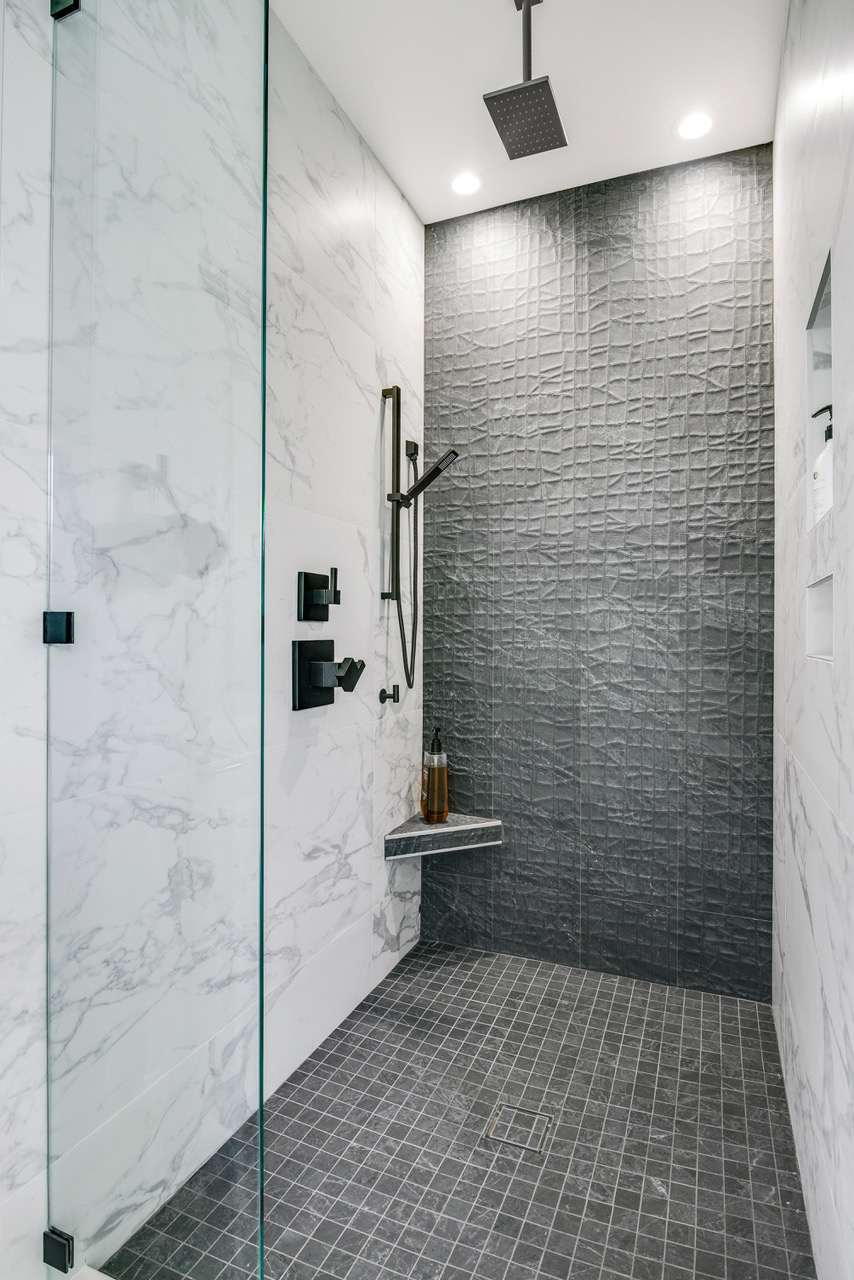 Wet room - Large format porcelain marble tile and textured tile
