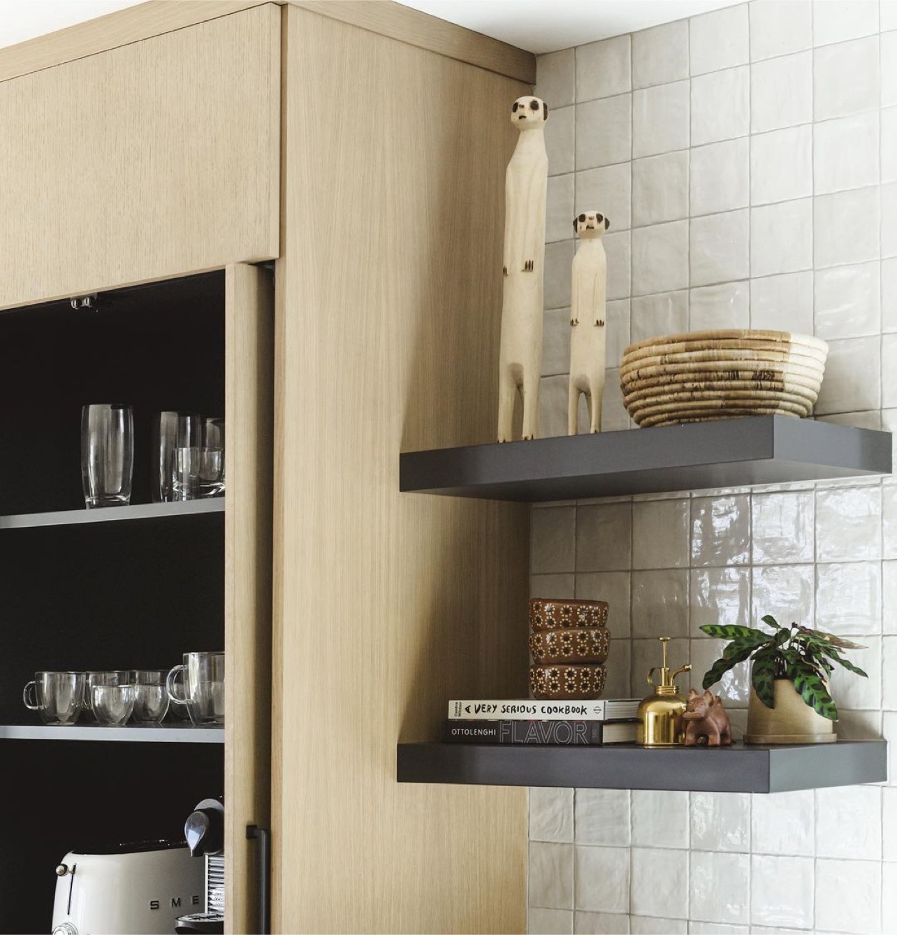 Open kitchen shelving and handmade ceramic wall tile