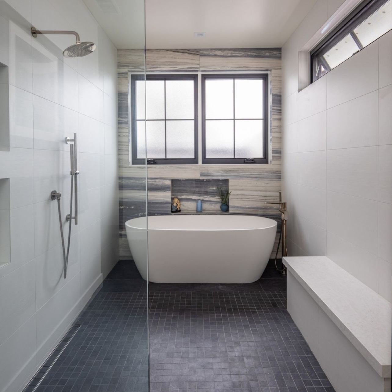 Primary bathroom wetroom with soaking tub