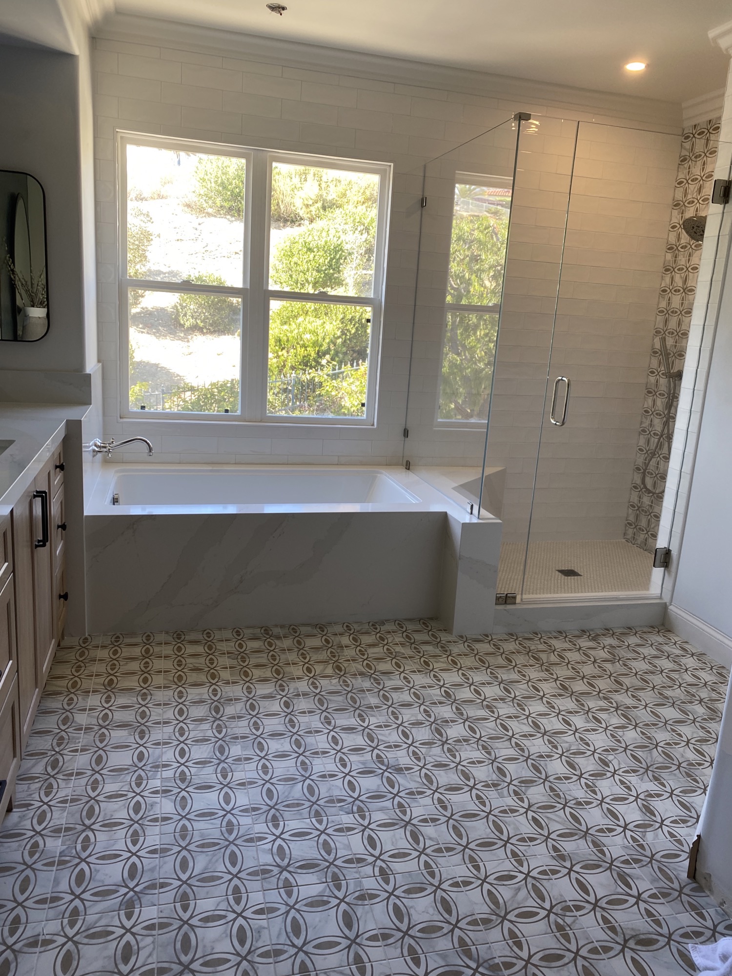 bathroom with decorative tile floor